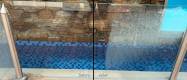 poolfence_calcium_buildup